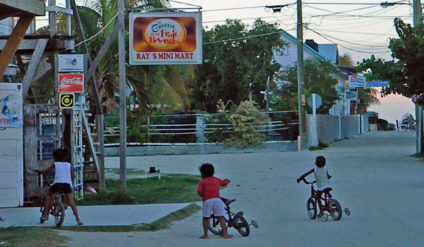 Girls bicycling to store