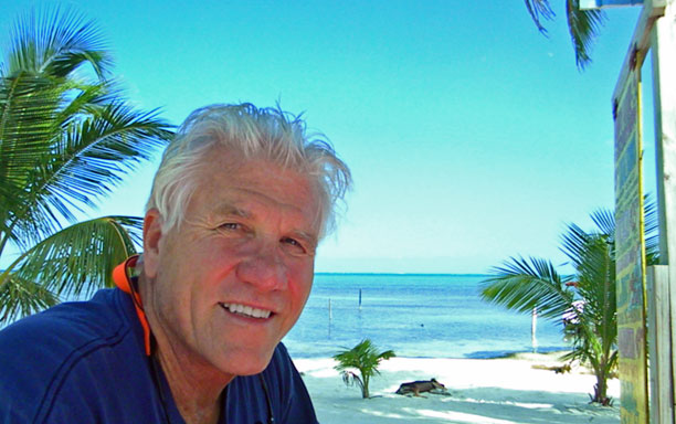 Bill and dog on beach