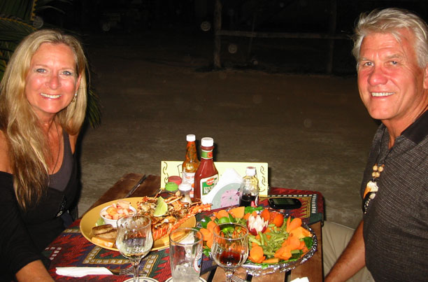 Mel and Bill seated for a feast
