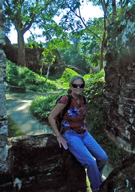 Mel on trail through administrator structures